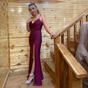 Formal gown. Burgundy / wine color. Size 6. Like new.